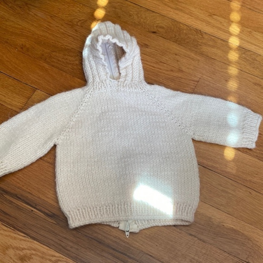 Vintage hand knit woven hooded sweater for a newborn baby EUC zips back.